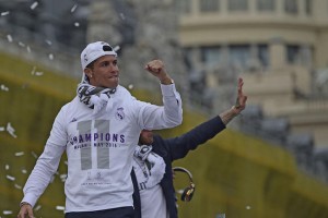 Real Madrid's Portuguese forward Cristiano Ronaldo gestures  in celebration of the team's win on Plaza Cibeles in Madrid on May 29, 2016 after the UEFA Champions League final foobtall match between Real Madrid CF, Club Atletico de Madrid held in Milan, Italy. / AFP / JAVIER SORIANO        (Photo credit should read JAVIER SORIANO/AFP/Getty Images)